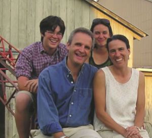 Chris Bray with his family at home in New Haven