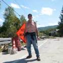 Hancock resident Steve Maynard directed traffic at the intersection of Routes 125 and 100 in Hancock in the days after Irene. VTD/Josh Larkin