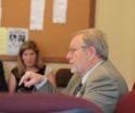 Former commissioner warns lawmakers not to interfere in merger case
