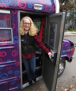Kathie McClure and her purple bus. Photo by Andrew Stein