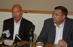 Entergy Vice President Jeff Forbes, left, and President Bill Mohl, right, tell a room full of reporters how the Louisiana-based corporation plans to proceed with shutting down and dismantling the Vermont Yankee nuclear plant. 