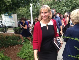 Burlington College President Christine Plunkett leave a board of trustees meeting Friday. Photo by Laura Krantz/VTDigger