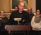Bram Kleppner, director of Vermont Cures, speaks at a Statehouse rally Tuesday in support of publicly financed health care. Photo by Morgan True/VTDigger