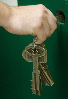 A guard locks a cell door at Northwest Correctional Facility. Photo by Terry J. Allen A guard locks a cell door at Northwest Correctional Facility. Photo by Terry J. Allen