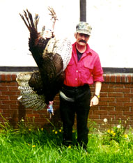 Photo of Barry Forbes holding a turkey