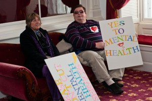 20110309--healthRally Chris Estey of Bristol, left, and Michael Booska of Middlebury take a moment in the Hall of Flags. Photo by Josh Larkin.