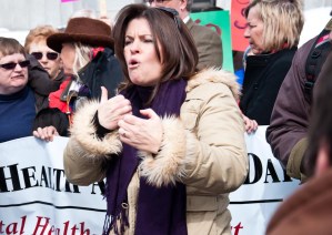 20110309--healthRally-5 A lone sign language translator communicates speakers' messages and rally cries to the crowd. Photo by Josh Larkin.