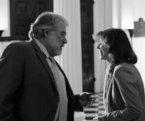 Senators Richard McCormack and Sally Fox share a laugh in the Statehouse front hall. VTD photo by Josh Larkin.
