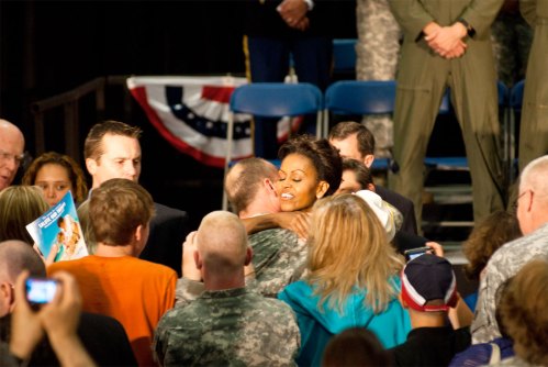 First Lady Michelle Obama hugs a Vermont National Guard member after speaking at the Army Aviation Support Facility at the Vermont National Guard airfield in South Burlington on Thursday June 30, 2011. Photo by Ian Thomas Jansen-Lonnquist