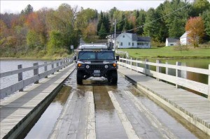 The 330-foot Floating Bridge, pictured here in 2001, crosses Sunset Lake in the heart of Brookfield. Photo by  Kim Stebbens.