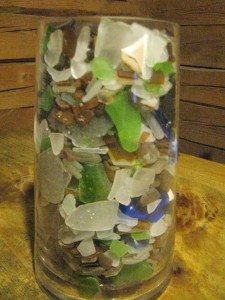 A jar of sea glass and ceramic shards that was collected over some two decades of sea glass outings along the coast of Maine. Photo by Dennis Jensen