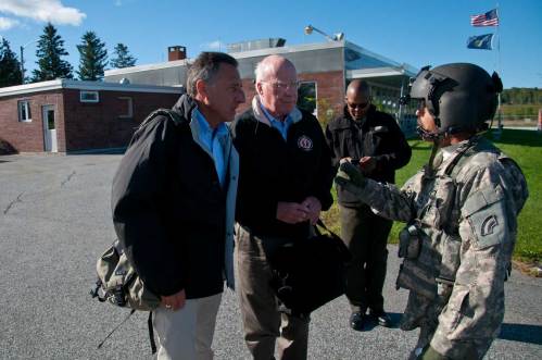 Gov. Peter Shumlin and Senator Patrick Leahy take instruction from a VT. Air National Guardsman before boarding a helicopter to survey damage in the state. VTD/Josh Larkin