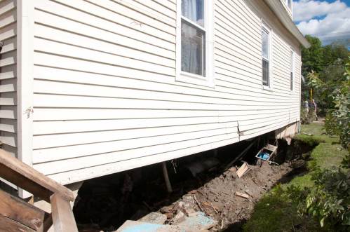 One entire side of the concrete foundation of a Moretown residence was washed away in the storrm. VTD/Josh Larkin