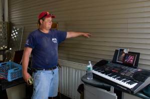 Water Level Irene Jeffrey Paronto of Graniteville points out the high water mark on the side of a mobile home in Berlin. VTD/Josh Larkin