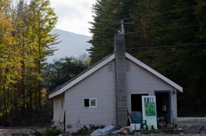 The sentiments of one Pittsfield resident are spelled out on a sign outside a flood ravaged home. VTD/Josh Larkin