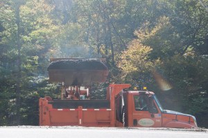 A VTrans dump truck picks up a load of fill alongside Route 100 south of the village of Warren. VTD/Josh Larkin
