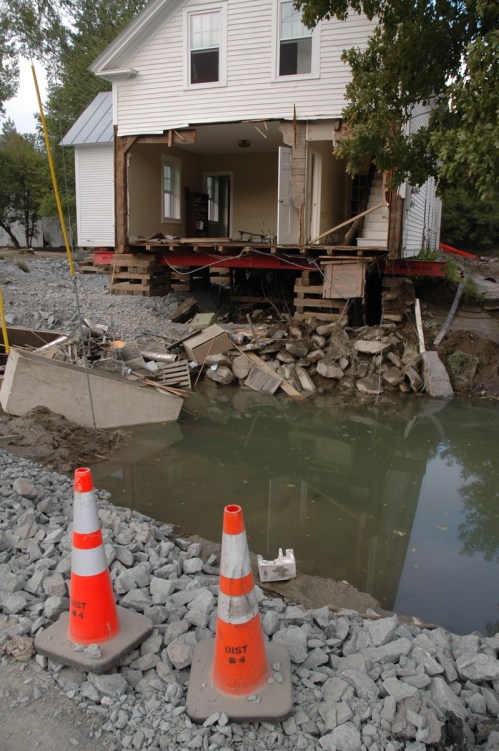 The White River jumped its banks in West Hartford and tore off the front of this house and swept away its foundation. VTD/Andrew Nemethy