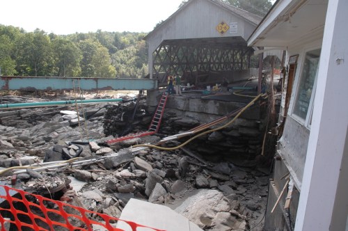 A yawning chasm now separates parts of Quechee Village by the iconic covered bridge. VTD/Andrew Nemethy