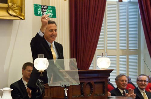 Gov. Peter Shumlin holds up the new "I am Vermont Strong" license plate during his State of the State Address. VTD/Josh Larkin