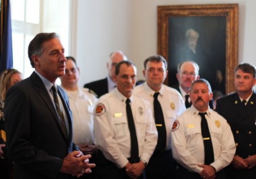 Gov. Peter Shumlin with emergency workers at a signing of S.106, the search and rescue bill. Photo by Alan Panebaker
