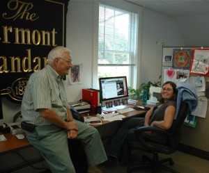 Phil Camp, publisher, and Gwen Stanley, a staffer with the Weekly Standard, chat in the newspaper's new offices. Photo by Andrew Nemethy