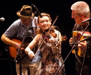 The sensation of the 2011 New World Festival was the 17-year-old fiddler for the John Whelan Band, Kathleen Parks. Kathleen was playing only her second gig with the band, which is fronted by accordionist Whelan and guitarist Flyn Cohen. (Photo by Tim Calabro, courtesy of Herald of Randolph)