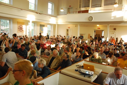 Opponents of basing the Air Force F-35 fighter jet with the Vermont Air Guard at Burlington International Airport gather at the Unitarian Universalist Church in Burlington. Photo by John Herrick/VTDigger