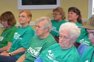 Home-care workers and AFSCME supporters listen to Laura Reyes, secretary-treasurer of AFSCME, AFL-CIO, at a press event Wednesday, May 29, 2013. Boxes full of signatures of support are at right. Photo by Alicia Freese/VTDigger