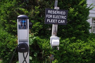 A recharging station for the state's fleet of solar vehicles sits at the corner of State Street and Gov. Aiken Ave. in Montpelier. Photo by Tom Brown/VTDigger
