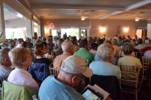 It was a full house at a meeting of  Lake Shoreland Protection Commission at the East Side Restaurant in Newport on Aug. 9, 2013. Photo by Alicia Freese/VTDigger, 