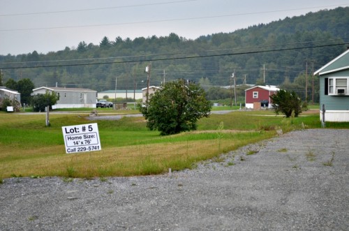 Many new homes have been installed at Weston Mobile Home Park off Route 12 in Berlin, but there are still empty lots. Photo by Alicia Freese/VTDigger
