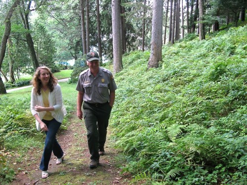 Marsh-Billings Rockefeller National Historical Park's curator Laura Anderson and ecologist Kyle Jones take a walk through the woodsy gardens that Elizabeth Billings helped create near the family mansion. Photo by Tom Slayton