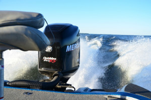 The 250 horsepower four-cycle engine on Tommy Waltz's bass boat can propel it down the lake at close to 80 mph. The speed is necessary to get to and from fishing spots in tournament fishing, but often can mean a brutal ride on Champlain's big waves. Photo by Andrew Nemethy