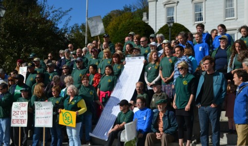 Vermont State Colleges staff, Vermont State Employees Association members, and other union members convened on the Statehouse steps Monday, Sept. 16, 2013, to call for "livable wages" for all VSC employees. Photo by Alicia Freese/VTDigger