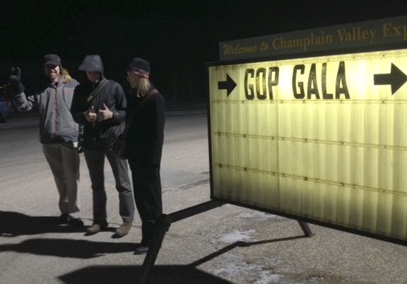 Paul Heintz, John Herrick and Nancy Remsen stand outside the Champlain Valley Expo. Photo by Anne Galloway