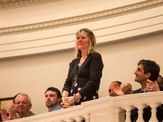 Documentary filmmaker Bess O'Brien is acknowledged by Gov. Peter Shumlin in his State of the State address. Photo by Roger Crowley