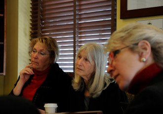 Reps. Carolyn Branagan, R-Georgia, Janet Ancel, D-Calais, and Alison Clarkson, D-Woodstock, listen to a presentation on student-staff ratios in Vermont public schools. Photo by Hilary Niles/VTDigger