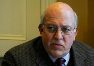 Stephen Dale, executive director of the Vermont School Boards Association, presents his organization's take on proposed requirements for independent schools to the Senate Education Committee on Tuesday, Jan. 21, 2014. Photo by Hilary Niles/VTDigger