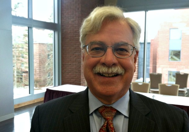 Lawrence Picus, author of a 2012 report on the state's education finance system, moderated the panel during an symposium on education financing at St. Michael's College on Tuesday. Photo by Hilary Niles/VTDigger