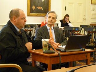 Andy Pallito, commissioner of the Department of Corrections, left, and Bobby Sand, senior policy advisor for the Department of Public Safety, talk with lawmakers on Jan. 9, 2014. Photo by Anne Galloway