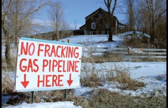 A sign stands in the yard of Jane and Nathan Palmer of Monkton, who are fighting to keep a natural gas pipeline from being built on their property. Addison Independent file photo/Zach Despart