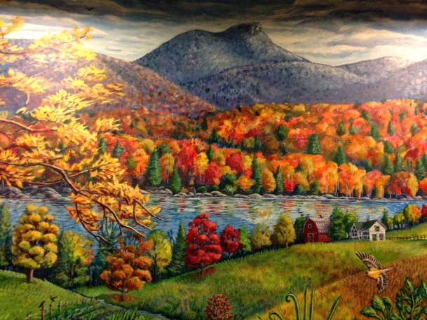 Mural painter Tara Goreau recently filled the wall of the new PIngala Cafe in Burlington with this colorful, bucolic farm landscape.  Photo courtesy Tara Goreau