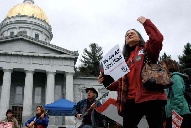 Demonstrators rallied at the Statehouse on Thursday for May Day. Photo by John Herrick/VTDigger 