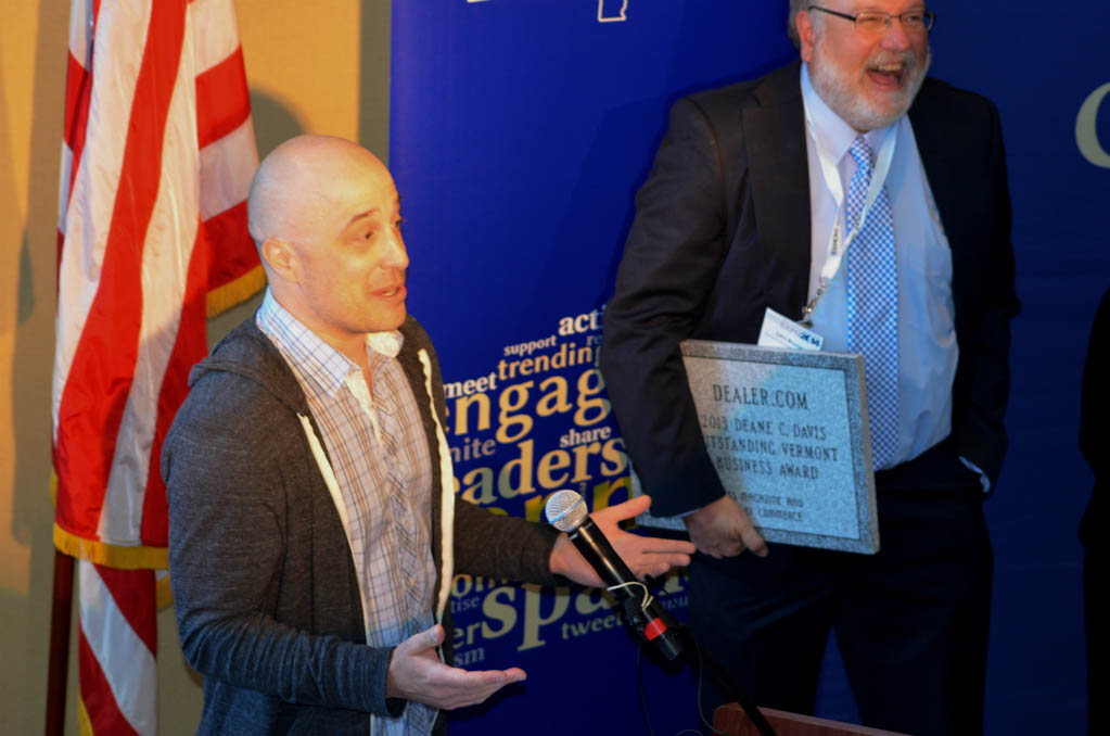 Mike Lane (left), co-founder and COO of Dealer.com, accepts the Deane Davis Outstanding Business Award on Wednesday. Vermont Business Magazine Publisher John Boutin holds the granite plaque. Photo by Vermont Business Magazine