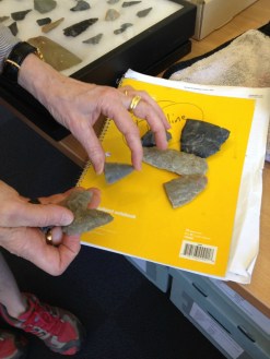 State Archeologist Giovanna Peebles holds Native American projectile points recovered in Vermont. Photo by Candace Page