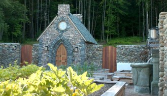 A stone chapel, part of an extensive wall and garden enclosure in northern Vermont, ranks as one of Thea Alvin's most elaborate and stunning projects. Reflecting stonework from the English countryside, it was built with help from a crew, students from Yestermorrow in Waitsfield, and a rock pile that measured 400 tons. Photo courtesy of Thea Alvin