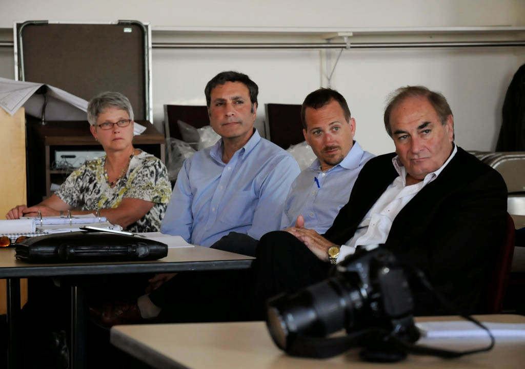 Debra Bell, Fred Grossfeld, Jerry Davis and Bill Kelly presented plans for AnC Bio at a public hearing Monday in Newport. Photo by Hilary Niles/VTDigger