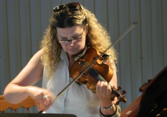 Violinist Mary Rowell grew up in the Northeast Kingdom, listening to the Craftsbury Chamber Players and taking lessons from members of the group. She grew up to become an in-demand specialist in contemporary music in New York City, but returns each summer to join the group that inspired her. Photo by Ashley Phelps, courtesy of the Craftsbury Chamber Players