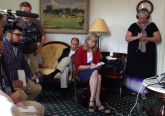 Lawrence Miller, chief of health care reform for the Shumlin administration, listens in on a press conference on the failings of Vermont Health Connect called by Republican leaders at the Statehouse on Tuesday, Aug. 5, 2014. Photo by Laura Krantz/VTDigger.org 