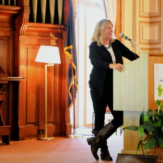 Cheryl DeVos of Kimball Brook Farm Organic Milk shared her experience raising "slow money" capital to restructure her family's business. Photo by Hilary Niles/VTDigger